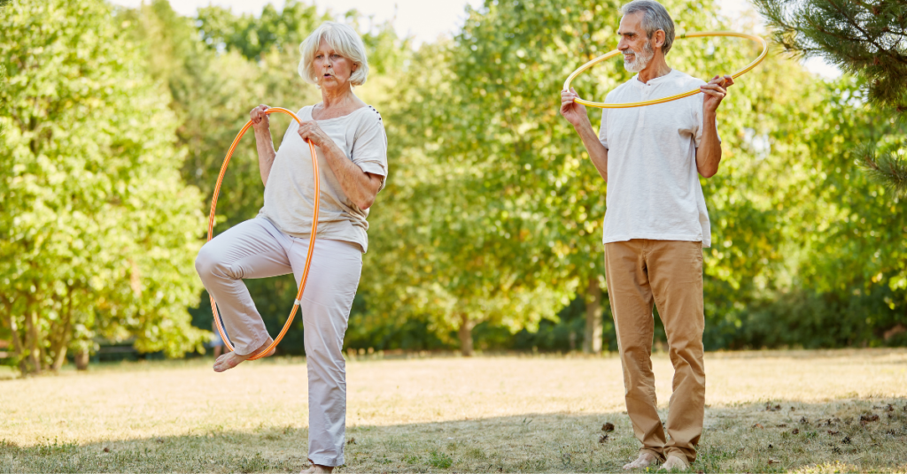 Seniors exercising and balancing